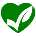 Green heart symbol with a white leaf inside on a white background